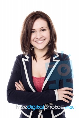 Cheerful Young Woman Posing Confidently Stock Photo
