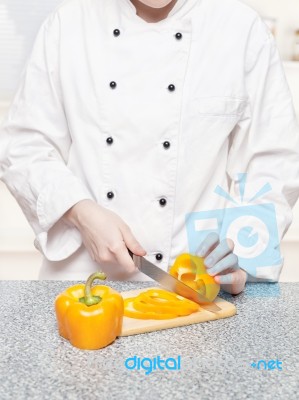 Chef Cutting Bell Peppers Stock Photo