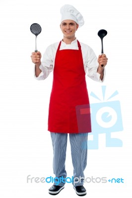 Chef Holding Kitchen Essentials Stock Photo