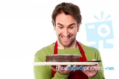 Chef Holding Yummy Chocolate Cake Stock Photo