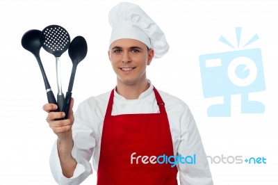 Chef Showing Kitchen Essentials Stock Photo