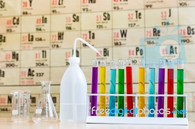 Chemistry With Colored Test Tubes And Glass Stock Photo