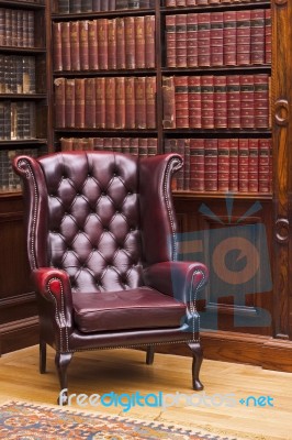Chesterfield Chair In The Library Stock Photo