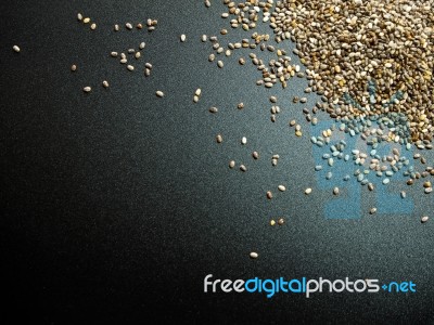 Chia Seed On Black Background Stock Photo