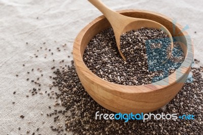 Chia Seeds In Wooden Bowl Background Stock Photo