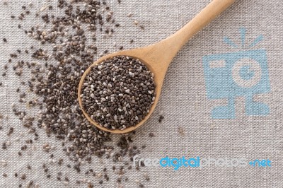 Chia Seeds In Wooden Spoon Top View Stock Photo