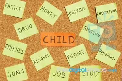 Child Concerns On A Cork Board Stock Photo