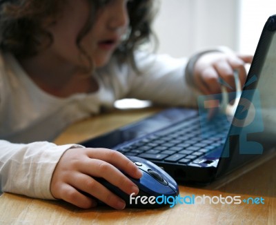 Child On Computer Stock Photo