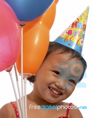 Child With Birthday Hat Stock Photo