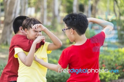 Children Getting Bullied On Outdoor Stock Photo
