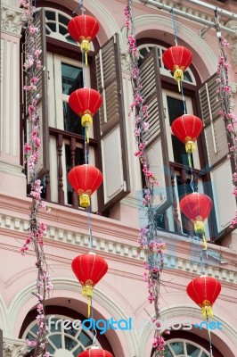 Chinese Lanterns Hanging From A Building In Singapore Stock Photo