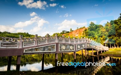 Chinese Style Bridge On The River Stock Photo