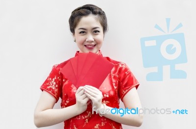 Chinese Woman Holding Red Envelopes Stock Photo