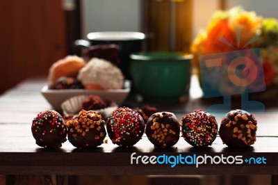 Chocolate And Donuts On The Table Stock Photo