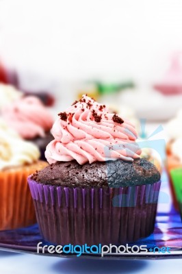 Chocolate And Strawberry Cream Cupcake Stock Photo