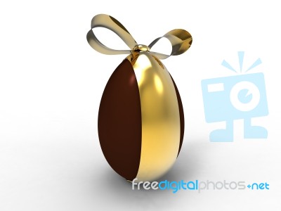 Chocolate Egg With Golden Ribbon Stock Image