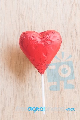 Chocolate Hearts Candies On Wooden Background Stock Photo