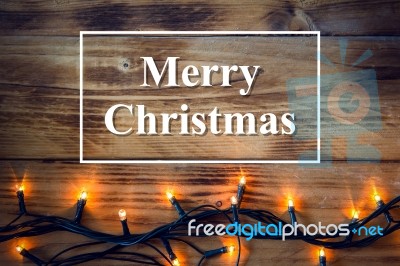 Christmas Background - Vintage Planked Wood With Lights And Text Space Stock Photo