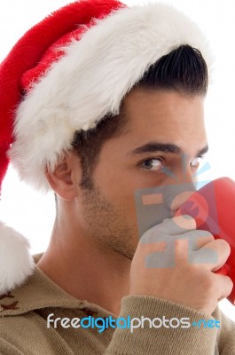 Christmas Guy Drinking Coffee Stock Photo