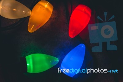 Christmas Lights Lying On The Floor Close Up Background Stock Photo