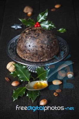 Christmas Pudding With Holly Twig Stock Photo