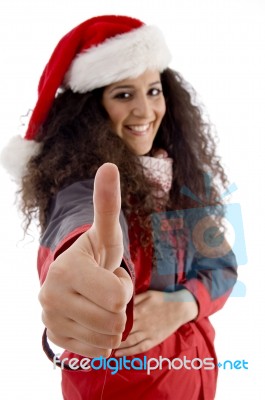 Christmas Woman Showing Thumb Up Stock Photo