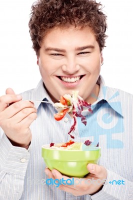 Chubby Man And Salad Stock Photo
