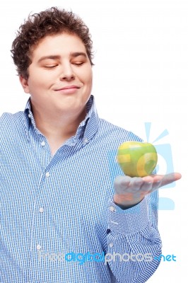 Chubby Man Holding Apple Stock Photo
