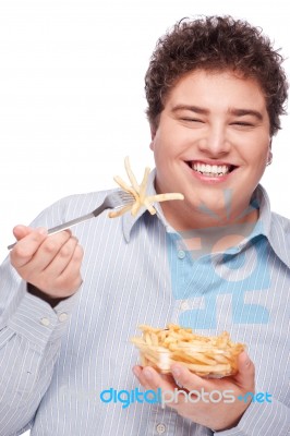 Chubby Man With French Fries Stock Photo