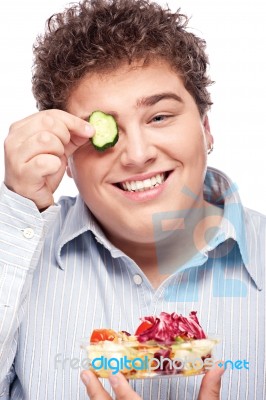 Chubby Man With Fresh Salad Stock Photo