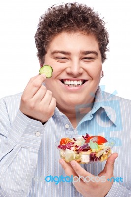 Chubby Man With Fresh Salad Stock Photo