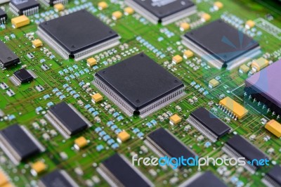 Circuit Board With Electronic Components Background Stock Photo