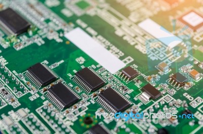 Circuit Board With Electronic Components Background Stock Photo