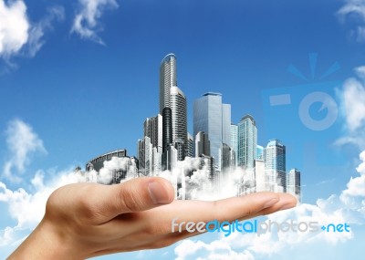 City In Human Hand Stock Photo