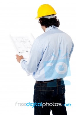 Civil Engineer Analyzing Construction Plan Stock Photo