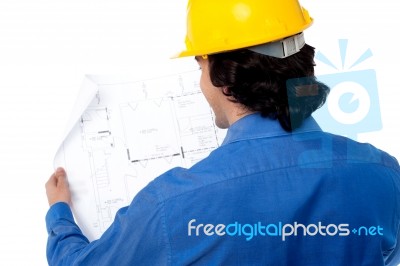 Civil Engineer Reviewing Blueprint Stock Photo