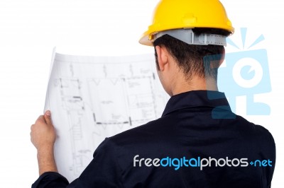 Civil Engineer Reviewing Blueprint Stock Photo
