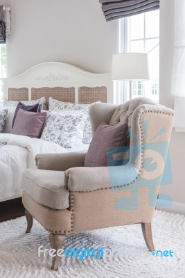 Classic Chair On Carpet With Pillow Stock Photo