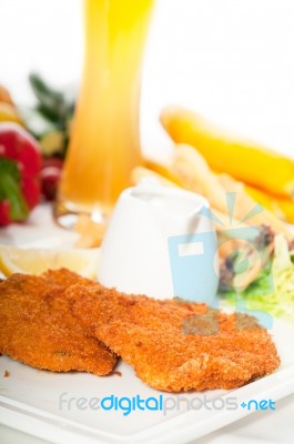 Classic Milanese Veal Cutlets And Vegetables Stock Photo