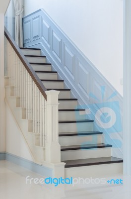 Classic Style Wooden Stair With White Railing Stock Photo