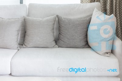 Classic White Sofa With Pillows Stock Photo