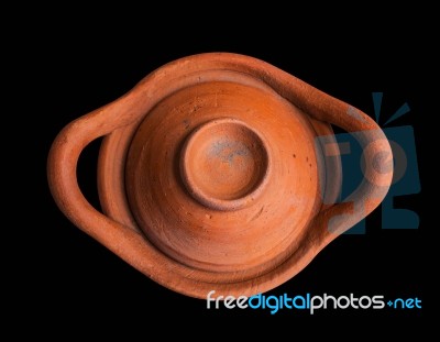 Clay Pot On A Black Background Stock Photo