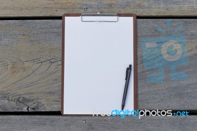 Clipboard And Blank White Paper Stock Photo