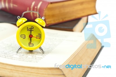 Clock And Book Stock Photo