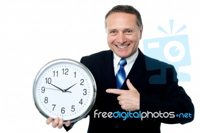 Clock Is In Business Man Hands Stock Photo