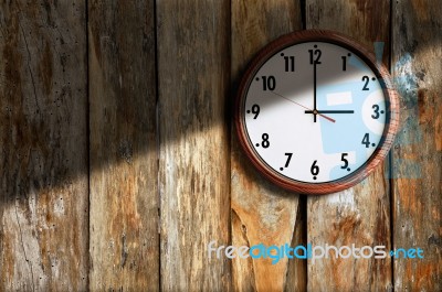 Clock On Old Wall Wooden Stock Photo