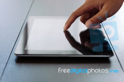 Close Hand Touching On Digital Tablet Stock Photo