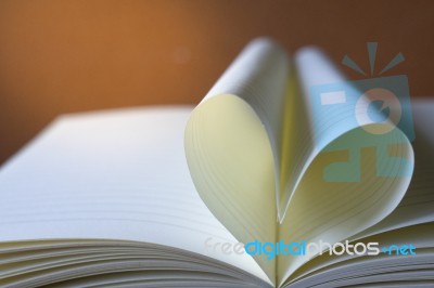 Close Up Heart Shape From Paper Book With Copy Space Background Stock Photo