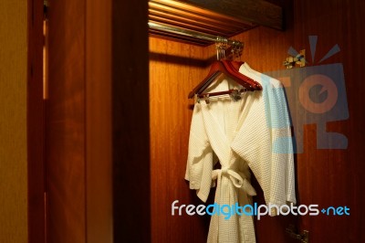 Close Up Of Clothes Hanger And Twins Bathrobe Stock Photo