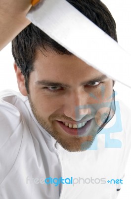 Close Up Of Male Chef Holding Knife Stock Photo